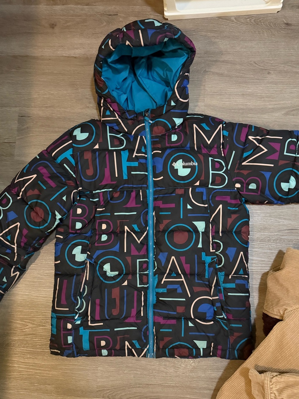 Columbia Black Puffer Jacket with Teal, Purple & Blue Letter Print